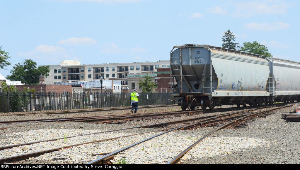 MA-2' Conductor walking towards ACFX 67967